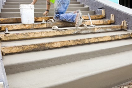 Pioneer Masonry and Construction mason building cement steps.